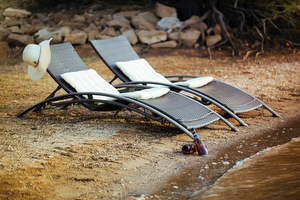 Sun chairs at the little beach in front of our finca
